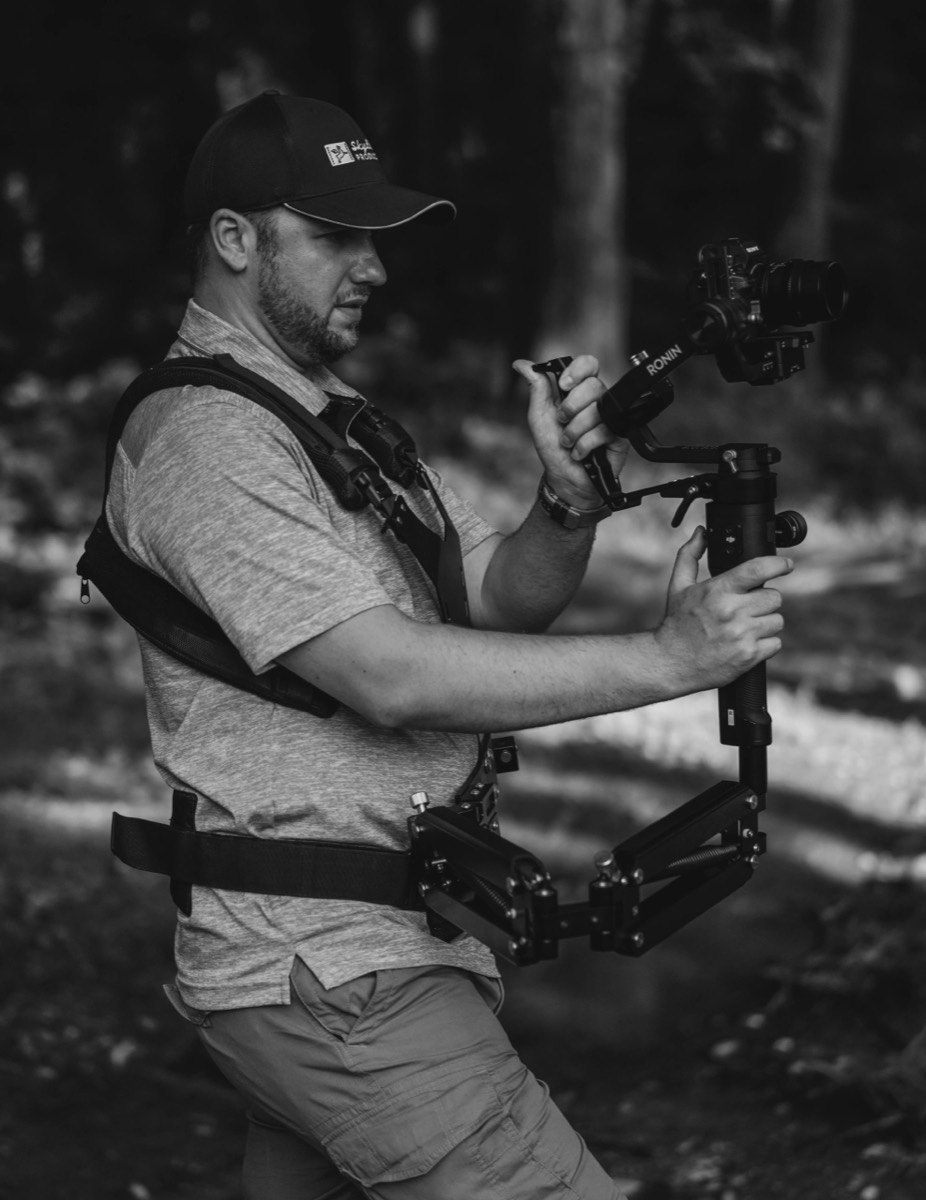Slawek Roszak filming with a gimbal camera rig